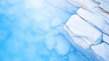 sereno ver de suave blanco piedras sumergido en claro azul agua, creando tranquilo y calmante atmósfera. amable matices evocar sentido de paz y relajación foto