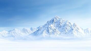 Majestic snow covered mountains rise against clear blue sky, creating serene winter landscape. vast expanse of white snow adds to tranquil beauty of this natural scene photo
