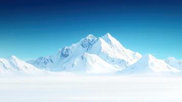 Majestic snow covered mountains rise against clear blue sky, creating serene winter landscape. vast expanse of white snow enhances tranquil beauty of this remote location photo