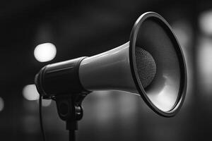 Close-up of a Black and Silver Megaphone on a Stand photo