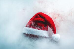 Red Santa Hat in a Cloud of White Smoke photo