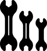 Three wrenches are shown in black on a white background vector