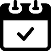 A calendar icon with a tick mark vector