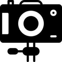 A camera with a tripod on it vector