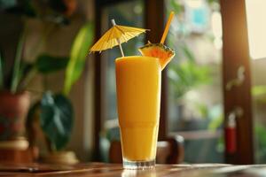 A drink with a pineapple and umbrella on a table photo