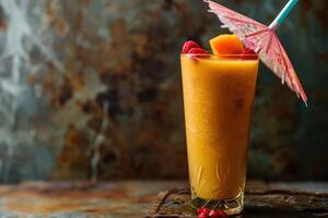 A drink with a colorful umbrella and fruit on a table photo