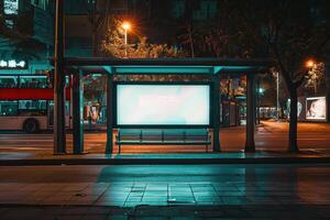 A bus stop with a billboard on it photo