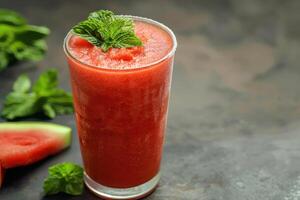 Watermelon smoothie with mint leaves photo