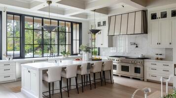 A kitchen with white cabinets and black windows photo
