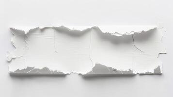 A piece of white paper torn in half photo