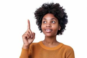 A woman pointing to something with her finger photo