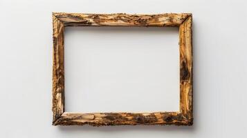 A wooden frame on a white wall photo