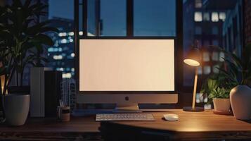 A computer screen on a desk in front of a window photo