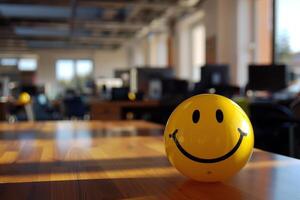 A yellow smiley face on a table photo