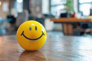 A yellow smiley face on a table photo