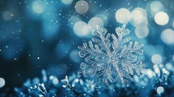 A snowflake is shown in front of a blue background photo