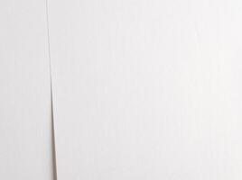 White paper with smooth lines and layered overlays, creating a tranquil and peaceful texture. The photo