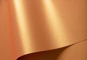 Golden paper with a metallic texture and chic waves, featuring a glowing gradient and shiny photo