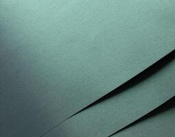 Paper with a rich texture and a minimalist, monochrome background featuring a luxurious gradient of photo
