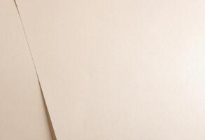 Beige paper texture with soft folds and a smooth, neutral surface. The minimal, abstract design photo