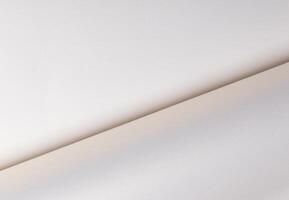 White paper background with a sparkling, glittering surface. The polished, bright, satiny texture photo