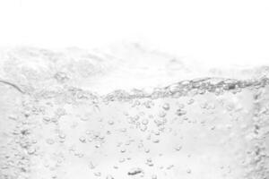 Air bubbles on a white background, perfect for designs and branding projects that highlight cleanliness and freshness photo
