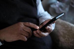 A person is actively using a smartphone for various forms of communication and activities photo