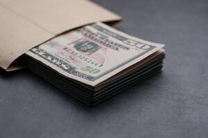 Cash in an Envelope Neatly Stacked Dollars Prepared for Secure Financial Transactions photo