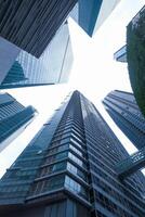 Modern Urban Architecture A Closer Look at Skyscrapers from Below in the City Environment photo