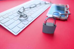 Digital security includes key elements like locks, keyboards, and smartphones for online safety photo