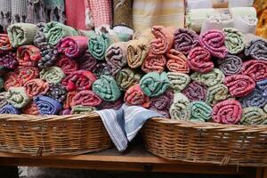 This is an exhibition of Colorful Handcrafted Towels that are beautifully Displayed in Baskets photo