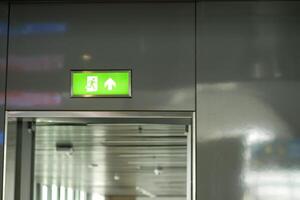 The contemporary design of a modern elevator display features an up direction indicator photo