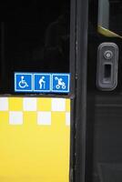 Enhancing accessibility with yellow checkerboard symbols for public transportation icon display photo
