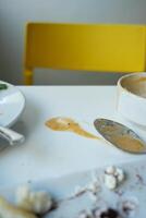 Spilled sauce and a messy table at the restaurant highlighted its cleanliness problems photo