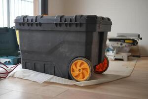 A highly durable rolling storage container designed specifically for both home and workplace use photo