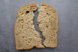 Sliced Whole Wheat Bread Half with a Dense Crumb Structure for Breakfast and Snacks photo