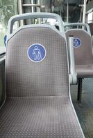 disable priority sit in a public bus , photo