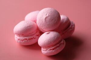 Delicious and visually appealing Pink Macarons beautifully Stacked on a Soft Pink Background photo