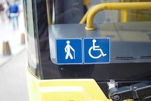 Enhancing accessibility with yellow checkerboard symbols for public transportation icon display photo