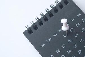 Sleek and Minimalistic Desk Calendar with Pin Feature for Enhanced Organization and Planning photo