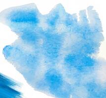 Abstract blue watercolor texture with soft brush strokes and gradient effect on a white background. photo