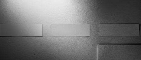 Grayscale smooth paper texture with a subtle shadow gradient, ideal for backgrounds or designs. photo