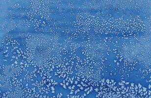 Abstract blue frost pattern resembling ice crystals, perfect for winter-themed designs, backgrounds, and creative projects. photo