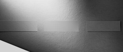 Grayscale smooth paper texture with a subtle shadow gradient, ideal for backgrounds or designs. photo