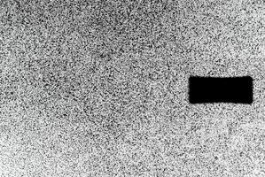 High-contrast black and white noise texture background, ideal for abstract design and graphic use. photo