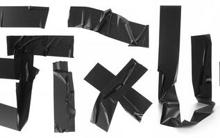 Various pieces of black duct tape in different shapes and sizes isolated on a white background, ideal for design, repair, or DIY projects. photo