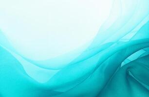 Abstract turquoise fabric texture with flowing waves and soft gradient, ideal for backgrounds or creative designs. photo