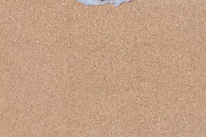 High-resolution cork board texture with a natural brown color, ideal for backgrounds and design projects. photo
