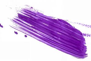Purple paint brush stroke on white background, perfect for use in art, design, or creative projects. photo