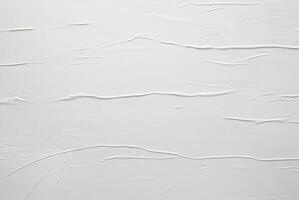 Minimalist white textured surface with soft horizontal lines and creases, ideal for abstract backgrounds, design, or texture use. photo
